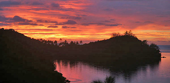 Sunrise at Matava on Kadavu (Fiji) from our thatched Fijian bure (hut)
